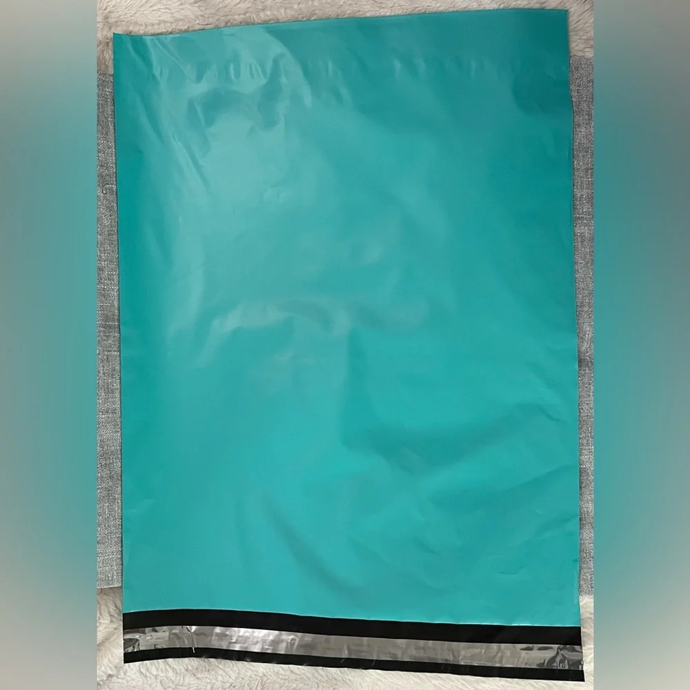 Floral & Teal Poly Mailers 10 each-20 total.Floral is 10”x13” Teal is 19”x 14.75